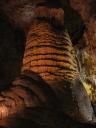 A closeup of a large stalagtite